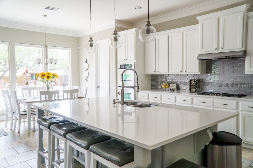 kitchen with white cabinets and counters